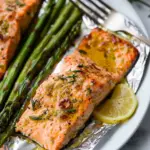 Baked Salmon in Foil with Asparagus and Garlic Butter Sauce